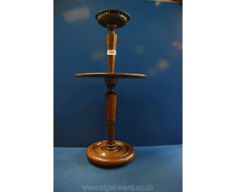 An Oak smoker's companion stand with turned support and arts crafts style copper ashtray to top, stamped PN and having centra
