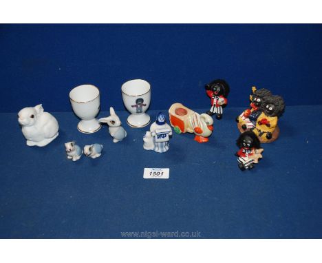A quantity of ornaments including two egg cups, Wade rabbits etc.  