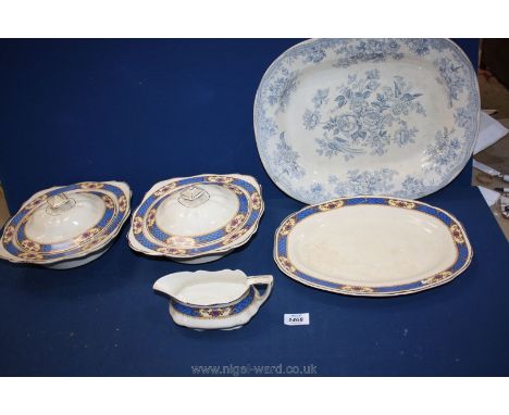 An Asiatic blue and white meat plate (chipped base) together with a part dinner set in cream and blue and gold coloured surro
