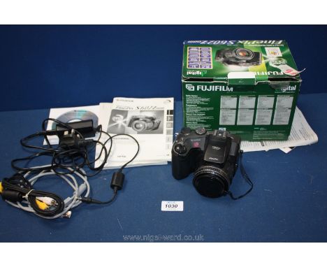 A Fuji Fine pix S602 zoom digital SLR Camera