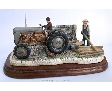 A Border Fine Arts figure group entitled 'Golden Memories' Ferguson 35 Tractor, boxed with certificate.