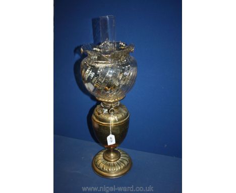An engraved brass Oil Lamp. 24" tall.