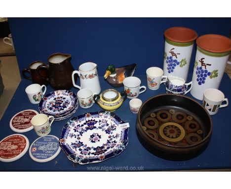 A quantity of china to include; two brown jugs, duck trinket box, children's cups, two ceramic utensil pots, blue &amp; white