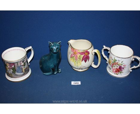 A Mr Pickwick tankard, Hammersley loving cup, Sadler jug and a Poole pottery cat.