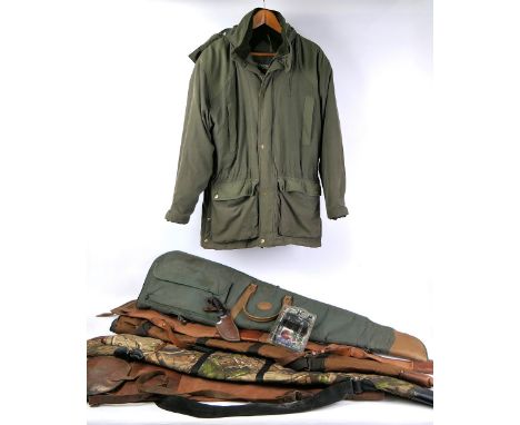 A Muela Grizzly fixed blade knife, with gut hook and 4 1/2" blade and leather sheath, together with a Deer Hunter jacket, an 