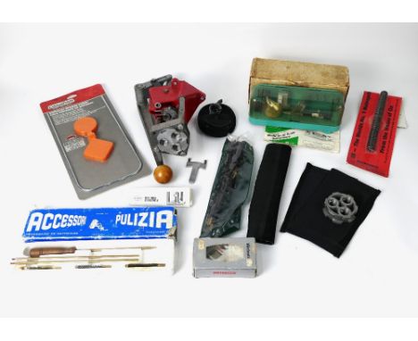 A box containing a Champion Spinner target, Lee re-loading press, Ox Spring No. 7, RCBS re-loading scale etc.