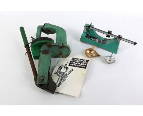 An RCBS reloading press, together with scales.