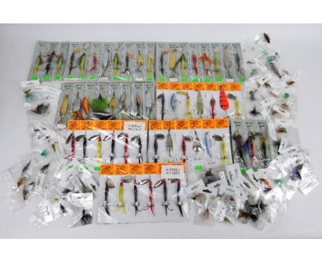 Fifty five assorted spinning lures and one hundred salmon flies.