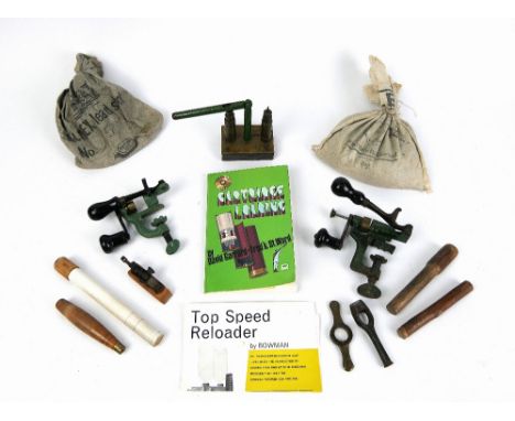 A collection of shotgun reloading tools - capper decapper, roll turnover, wad punch etc. and "Cartridge Loading" by David Gar
