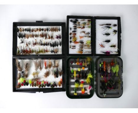 Three fly boxes all containing trout flies, lures etc.