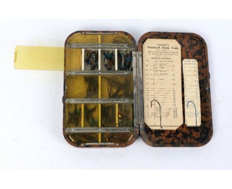 A Hardy style tortoiseshell fly box, in the Naroda style with various compartments and Farlows Standard hook scale to the lid