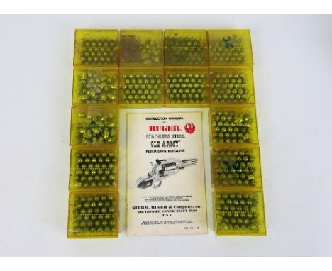 Four hundred + cast soft lead bullet heads, for Ruger Old Army percussion pistol plus manual.