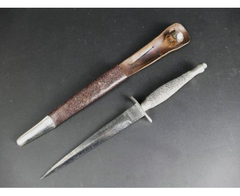 A Fairbairn Sykes Wilkinson Sword FS fighting knife, first pattern with etched markings to the blade, the FS Fighting Knife a