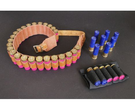 Thirty eight 12 bore shotgun cartridges, to include Eley Hi-Flyer fibre 32 gram 6 and a leather and canvas cartridge belt.  S