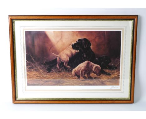 John Trickett, a signed limited edition print 629/850, depicting Black Labrador with three puppies. 32 x 54 cm, framed and mo