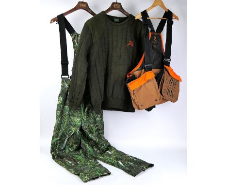 Browning shooting vest in blaze orange, marked One Size, a quilt knit lined jumper Size XL and a pair of Klobba camouflage tr