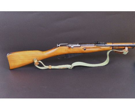 Mosin Nagant M44 cal 7.62 x 54 bolt action rifle, with fixed bayonet, the action stamped 1953, the action bolt and magazine f