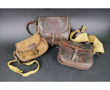 Three vintage cartridge bags, two leather, one leather and canvas.