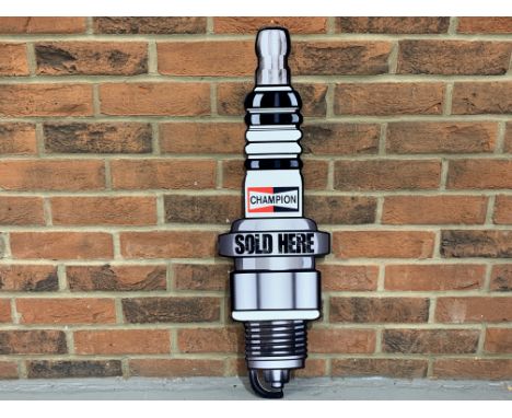 Metal Large Champion Spark Plug Sold Here SignMake: Contact AuctioneerModel: Contact AuctioneerYear: 0Mileage: 0VIN: Contact 
