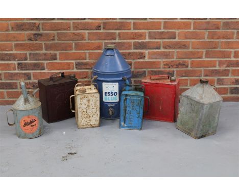 Seven Vintage Oil &amp; Paraffin Cans Make: Contact AuctioneerModel: Contact AuctioneerYear: 0Mileage: 0VIN: Contact Auctione