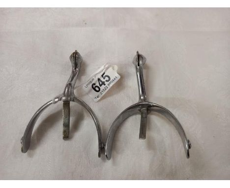 A pair of vintage chrome plated riding spurs. 