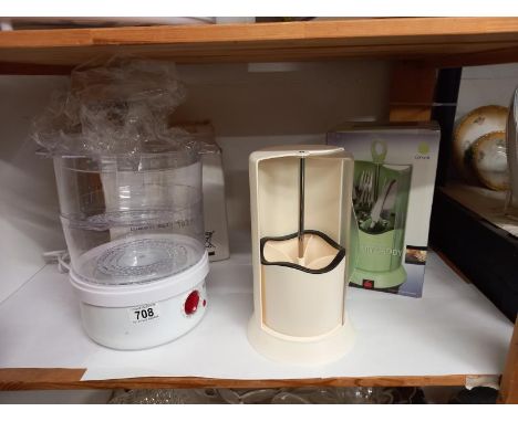 A steamer and a cutlery caddy. 