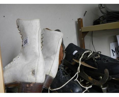 Two pairs of vintage ice skates. 