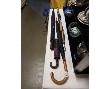 A vintage umbrella &amp; 3 others