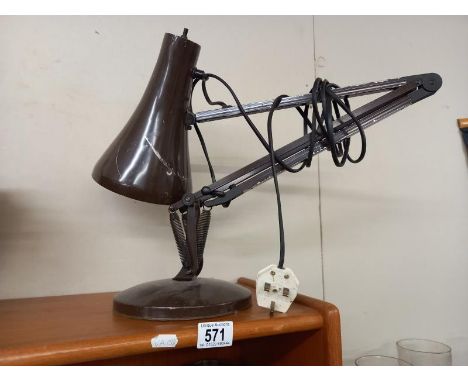 An Anglepoise lamp 