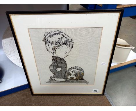 A framed tapestry of a boy with dog (48cm x 52cm) 