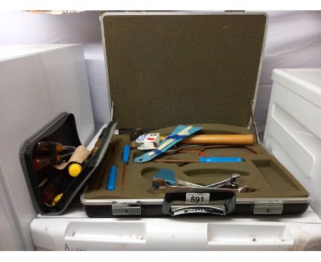 An executive cased set of tools (possibly missing 2 items) etc. 