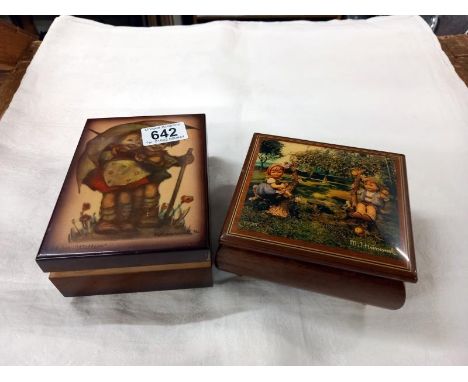 Two vintage Hummel musical jewellery boxes and a Hummel bracelet. 