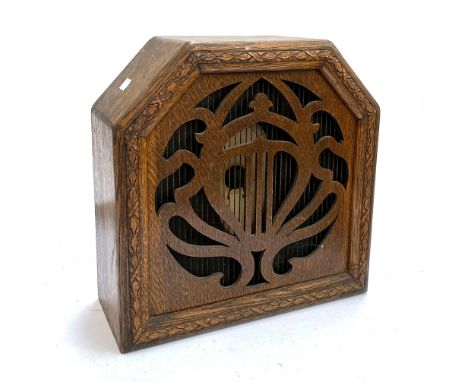 A vintage Celestion speaker in oak case 