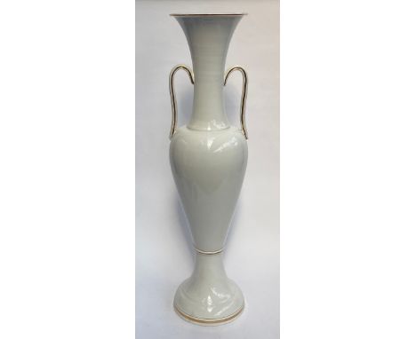 A very large decorative white ceramic twin handled urn, with gilt detail, 90cmH 
