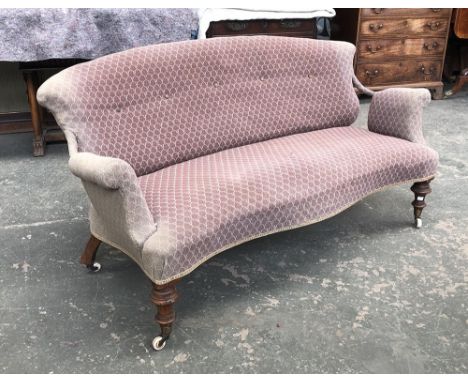 A small 19th century open arm two-seater sofa, turned front legs with brass caps and ceramic casters, 150cmW 