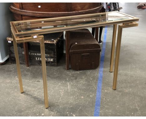 A Pierre Vandel, Paris gilt metal console table with bevelled glass top, 110cmW 