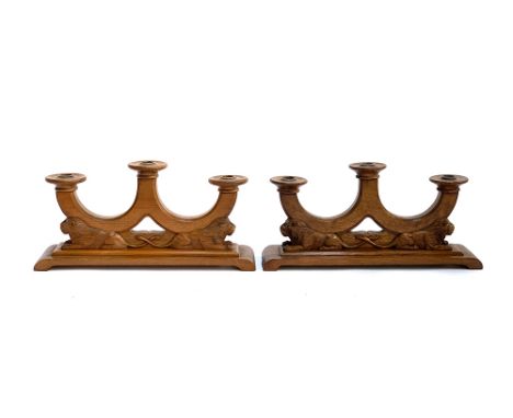 Interior design interest: A smart pair of early 20th century carved wooden three arm candlestick holders, modelled as two rec