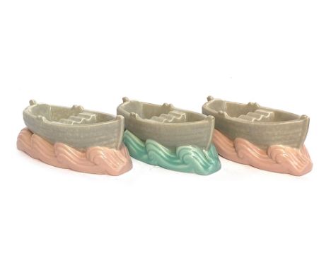 Three Poole Pottery dinghies, each stamped C50 to base, 17cmL