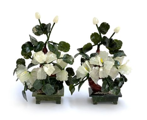 A pair of decorative Chinese carved jade 'bonsai peony' trees, both 30cmH 