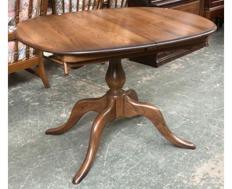 An Ercol elm extending D end dining table, 103x88x73cmH 