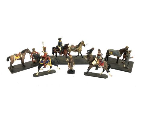 Two Historex plastic figures of soldiers on horseback, together with a Rose metal model soldier, etc 