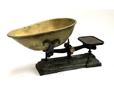 A set of Day &amp; Millward cast iron shop scales, 32cmH 