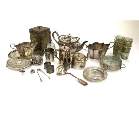 A mixed lot to include silver plated teapot, jugs, tea caddy, cut glass bell, etc 