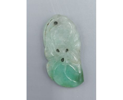 A Chinese carved Jade pendant, 3cms long
