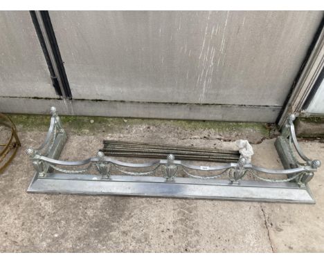 A VINTAGE METAL FIRE FENDER AND STAIR RODS WITH BRACKETS MARKED 'H&amp;H' 