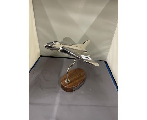 A SOLID CHUNKY MODEL OF A VULCAN ON A HARDWOOD BASE WITH HISTORY PLAQUE, HEIGHT 20CM 