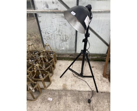 A RETRO FLOOR LAMP WITH TRIPOD STAND 