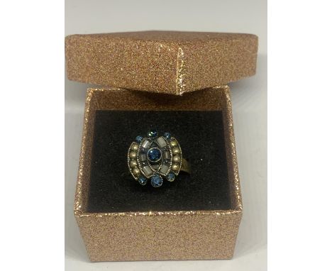 A VINTAGE DRESS RING WITH BLUE STONES AND PEARLS IN A PRESENTATION BOX 