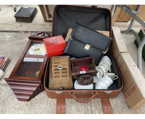 AN ASSORTMENT OF ITEMS TO INCLUDE A WALL CLOCK, CUPS AND A ROMANY CART ETC 