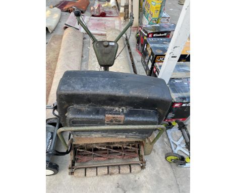 A LARGE VINTAGE CYLINDER MOWER WITH GRASS BOX 